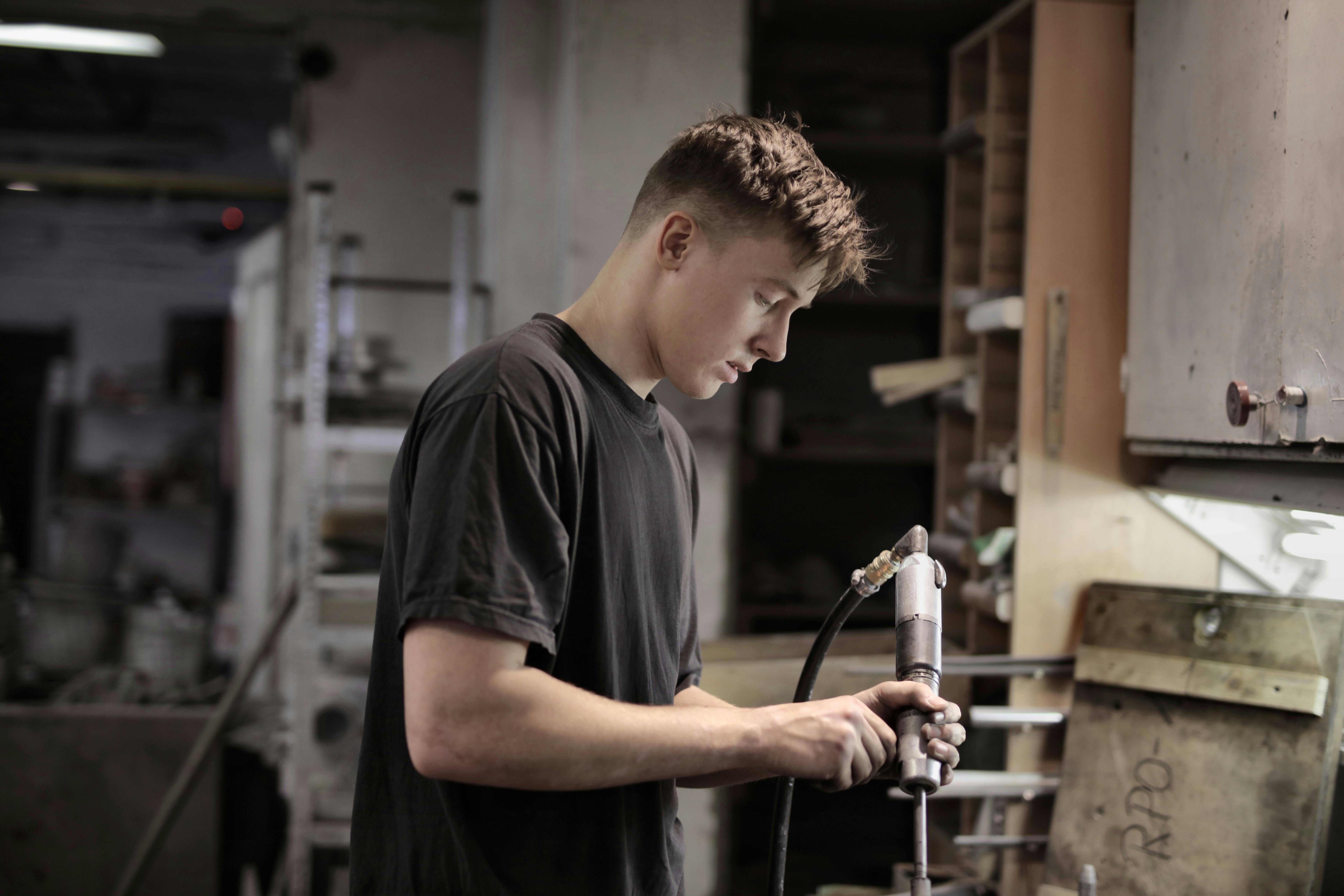 young man working in mechanics